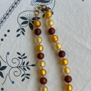 Yellow and dark red glass bead necklace